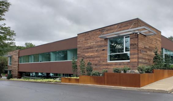 Shou Sugi Ban Shallow Char clads the outside of this office building in Pittsford, NY.