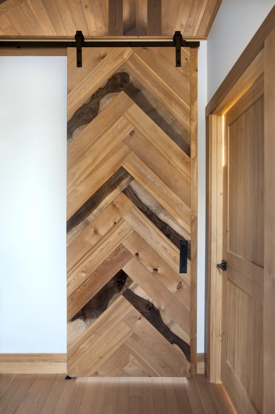 Flat track door in a herringbone pattern with multiple species.