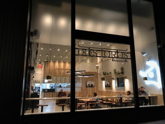 This newer location of Dos Toros on State Street features Sustainably Harvest Hickory Paneling and Larch ceiling beams.