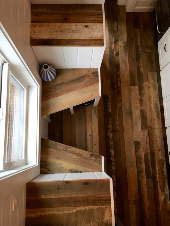 Pioneer Millworks Settlers Plank Mixed Hardwoods reclaimed wood flooring in a tiny home in Portland, OR