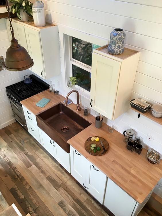 Pioneer Millworks Settlers Plank Mixed Hardwoods reclaimed wood flooring in a tiny home in Portland, OR