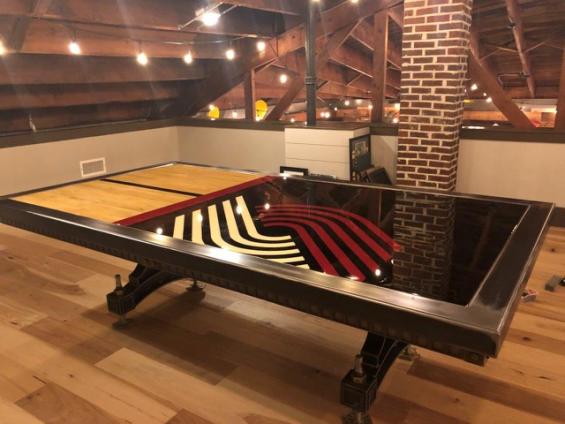 Pioneer Millworks Trail Blazer Gym Flooring Slab made into a custom table for a residential home.