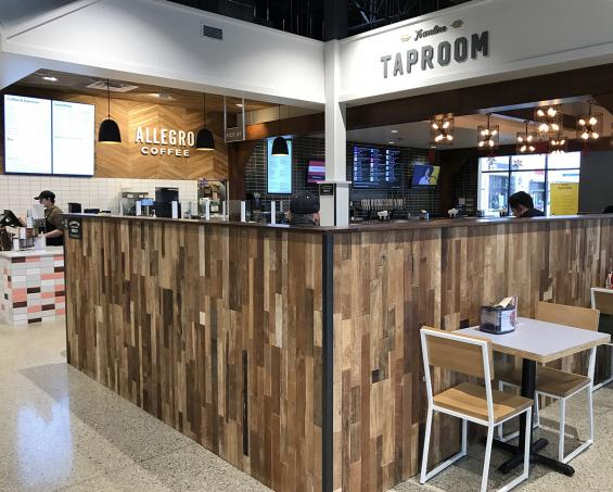 Multi-strip Indonesian Teak paneling is featured on the walls