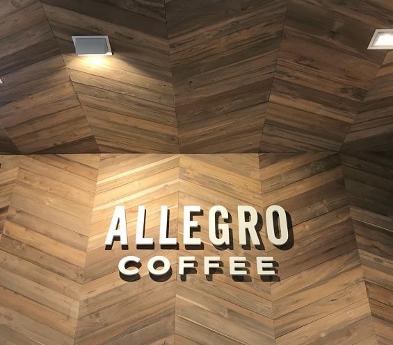 Bright Indonesian Teak is used for the chevron patterned ceiling. All wood is finished with a penetrating fire retardant.