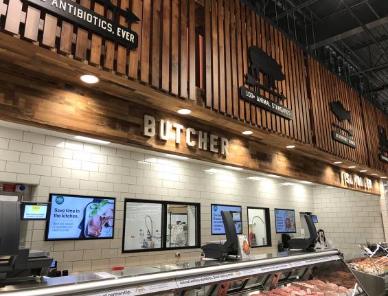 Multi-strip Indonesian Teak paneling is featured on the walls