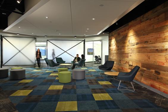 This office for technology company in Bellavue, Washington features Pioneer Millworks reclaimed barn wood paneling, American Prairie Taphouse. Photos by Cleary OFarrell Photography.