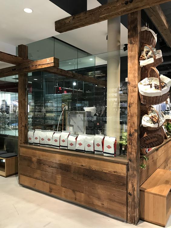 Pioneer Millworks Reclaimed Timbers and American Prairie Brownboard Paneling in Muji, Hudson Yards NYC