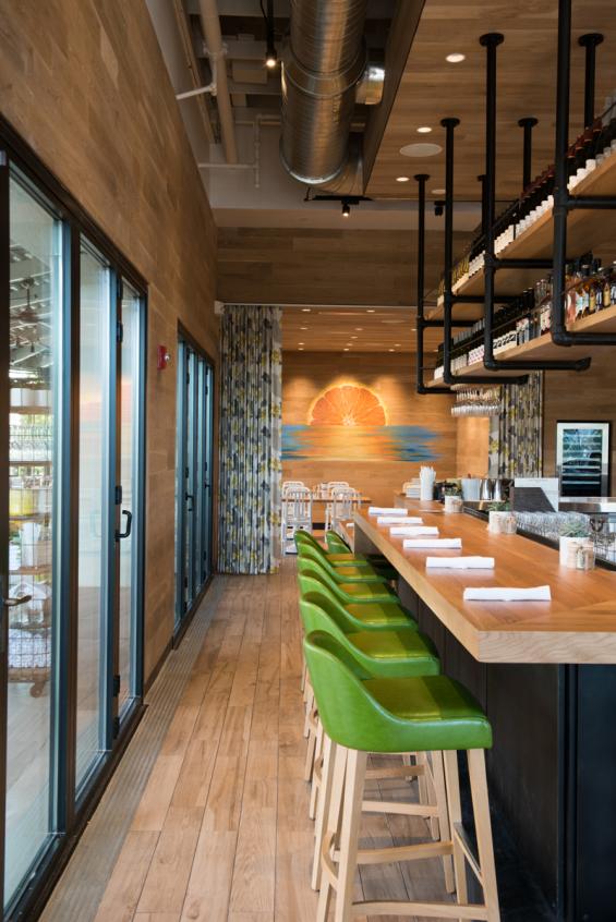 Pioneer Millworks Modern Farmhouse Clean White Oak paneling in True Foods Kitchen, Jacksonville, Florida