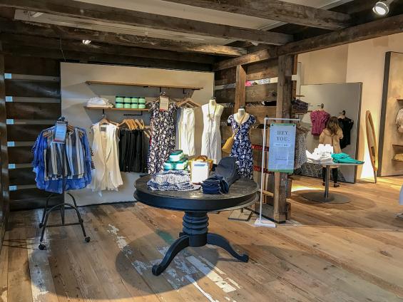 Pioneer Millwork reclaimed softwoods custom mix floor and reclaimed As-Found Industrial Timbers in Anthropologie, Natick, MA.