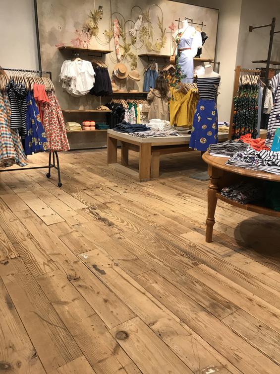 Pioneer Millwork reclaimed softwoods custom mix floor in Anthropologie, Natick, MA.