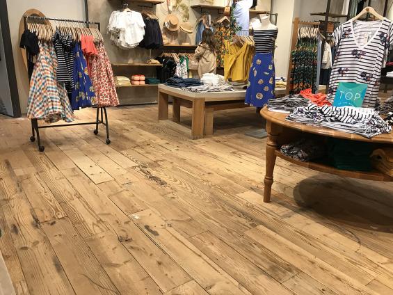 Pioneer Millwork reclaimed softwoods custom mix floor in Anthropologie, Natick, MA.