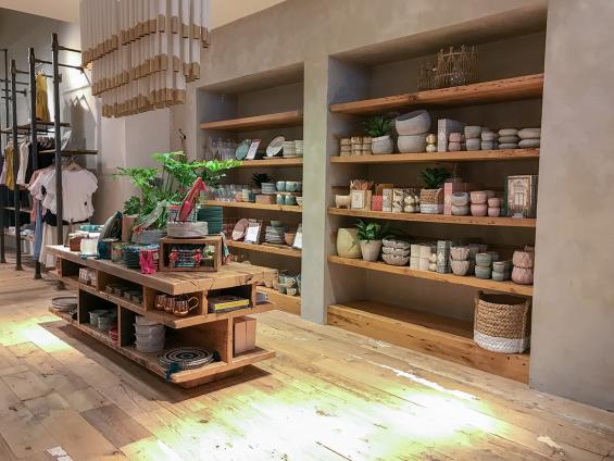 Pioneer Millwork reclaimed softwoods custom mix floor and reclaimed Oak shelving in Anthropologie, Natick, MA.