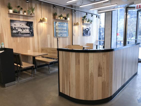 Pioneer Millworks Modern Farmhouse Hickory with a custom finish on walls in Dos Toros, Chicago—Hancock Building