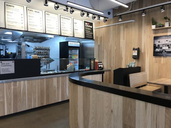 Pioneer Millworks Modern Farmhouse Hickory with a custom finish on walls in Dos Toros, Chicago—Hancock Building