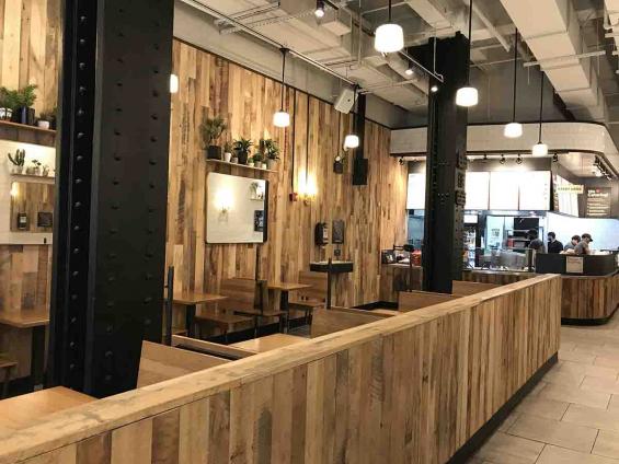 Mixed Hardwoods Settlers' Plank reclaimed wood paneling at Dos Toros Taqueria in New York City