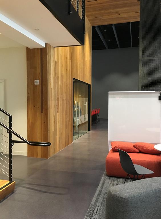 Pioneer Millworks reclaimed American Gothic Ash with poly and fire retardant used on wall paneling in San Fransisco, CA