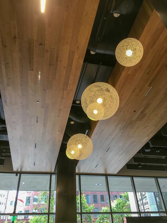 Pioneer Millworks reclaimed American Gothic Ash with poly and fire retardant used as ceiling accents in San Fransisco, CA