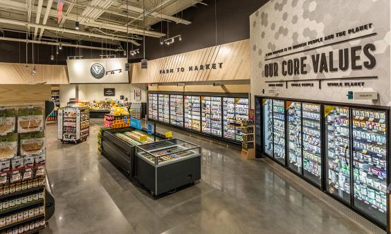 Pioneer Millworks Whole Modern Farmhouse Clean Ash paneling with poly and fire retardant in Whole Foods, Atlanta, GA
