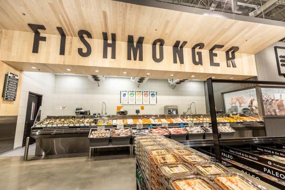 Pioneer Millworks Whole Modern Farmhouse Clean Ash paneling with poly and fire retardant in Whole Foods, Atlanta, GA