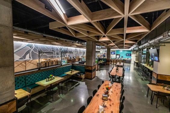 Pioneer Millworks Whole Modern Farmhouse Clean Ash accent ceiling installation with poly and fire retardant in Whole Foods, Atlanta, GA