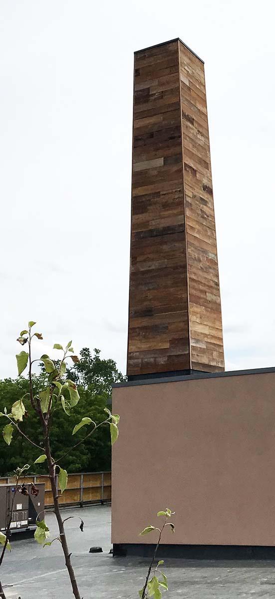 Pioneer Millworks Reclaimed Custom Indonesian teak–paneling.