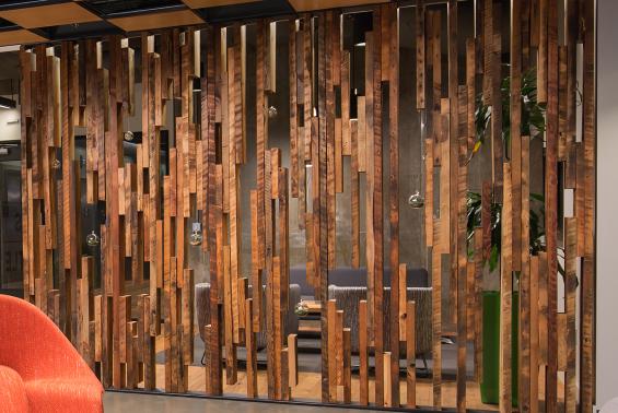 Detail of slat wall created from as found Douglas Fir joists with skip planed patina. (c) Clearly O'Farrell Photography.