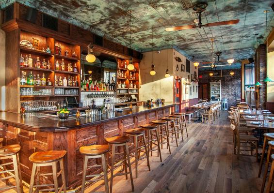 Pioneer Millworks Black & Tan–Tan Mixed Oak flooring. 