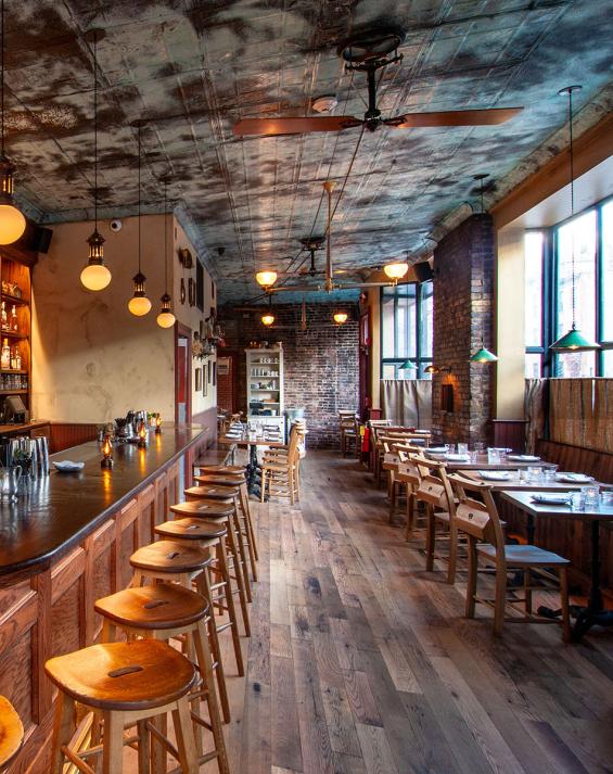 Pioneer Millworks Black & Tan–Tan Mixed Oak flooring. 