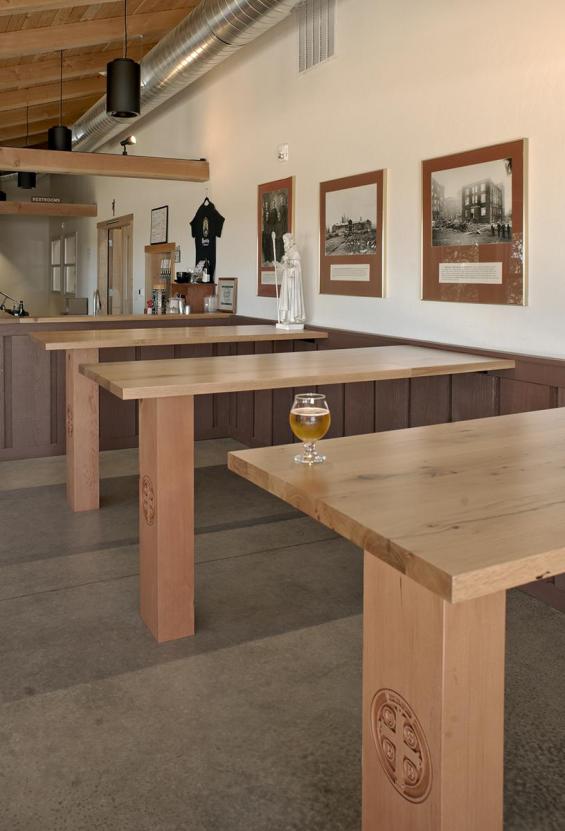 Benedictine Brewery tasting room tables are topped with American Gothic White Oak.