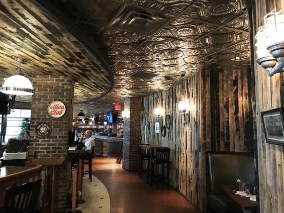 Pioneer Millworks  Reclaimed Black & Tan–50/50 Oak wall paneling.