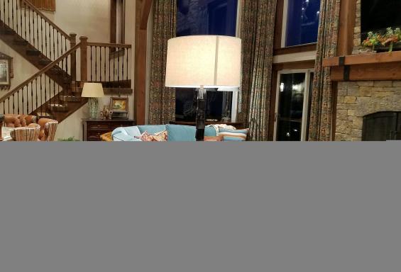 Pioneer Millworks American Gothic Ash flooring with a Castle Brown finish applied.