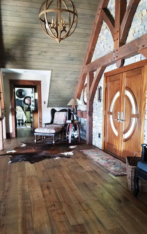 Pioneer Millworks American Gothic Ash flooring with a Castle Brown finish applied.