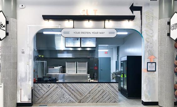 Pioneer Millworks Shou Sugi Ban Larch White on this counter wrap for The Cut, in Rochester, NY.