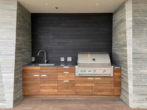 Pioneer Millworks Shou Sugi Ban FSC-Certified® Douglas fir Deep Char used as paneling for an outdoor cooking area in California.