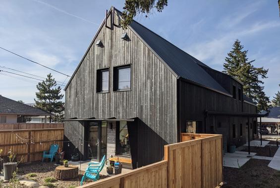 Pioneer Millworks Larch Siding in Black and Pebble finish. Green Hammer Builders and 22 Pages Photography