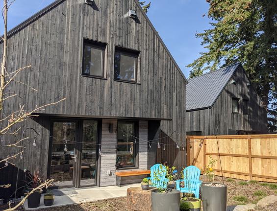 Pioneer Millworks Larch Siding in Black and Pebble finish. Green Hammer Builders and 22 Pages Photography