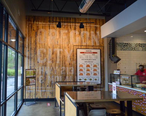 Pioneer Millworks reclaimed Foundry Maple Painted & Sanded in blue featured on this accent wall for MOD Pizza in Oregon City, OR.