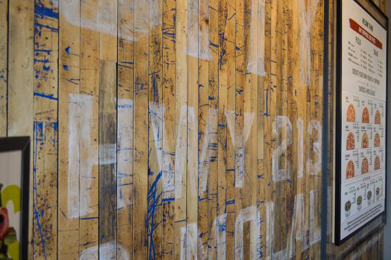 Pioneer Millworks reclaimed Foundry Maple Painted & Sanded in blue featured on this accent wall for MOD Pizza in Oregon City, OR.