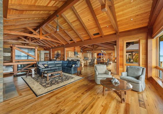 Pioneer Millworks reclaimed Black & Tan-–Tan Oak flooring & Standard Larch wall paneling.