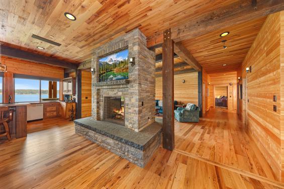 Pioneer Millworks reclaimed Black & Tan-–Tan Oak flooring & Standard Larch wall paneling.