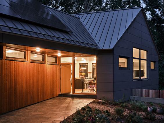 Pioneer Millworks Larch Exterior Siding for Passive House in Cape Cod. Photo © Dan Cutrona