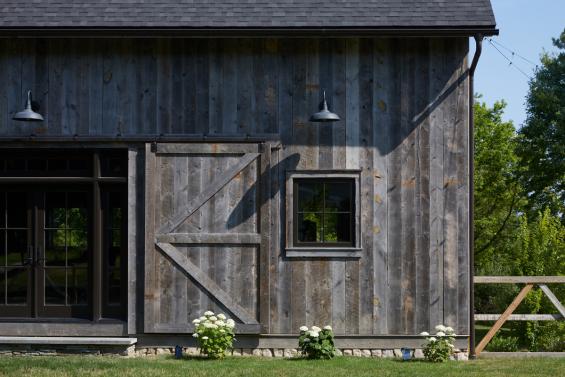 Pioneer Millworks Farmed Board Siding featured on a private barn in Upstate New York. Photos by Tim Wilkes