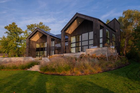 Private Residence in the Finger Lakes Region of New York featuring Pioneer Millworks Accoya Siding in Black and Sand