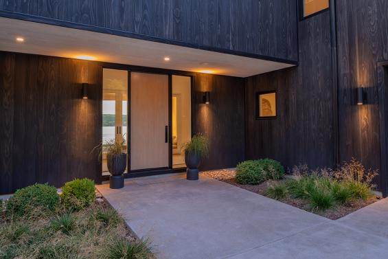 Private Residence in the Finger Lakes Region of New York featuring Pioneer Millworks Accoya Siding in Black and Sand