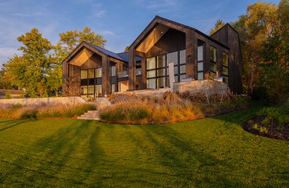 Private Residence in the Finger Lakes Region of New York featuring Pioneer Millworks Accoya Siding in Black and Sand