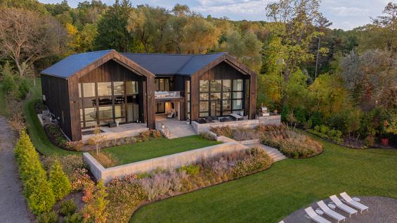 Private Residence in the Finger Lakes Region of New York featuring Pioneer Millworks Accoya Siding in Black and Sand