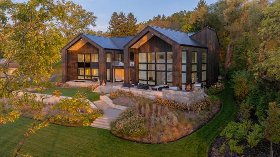 Private Residence in the Finger Lakes Region of New York featuring Pioneer Millworks Accoya Siding in Black and Sand