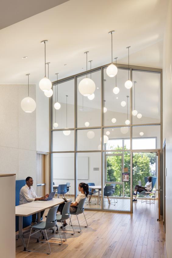 Pioneer Millworks Accoya Sand Siding and American Gothic Reclaimed White Oak Flooring in the Davis Center at Williams College. Photo by Albert Vecerka/Esto
