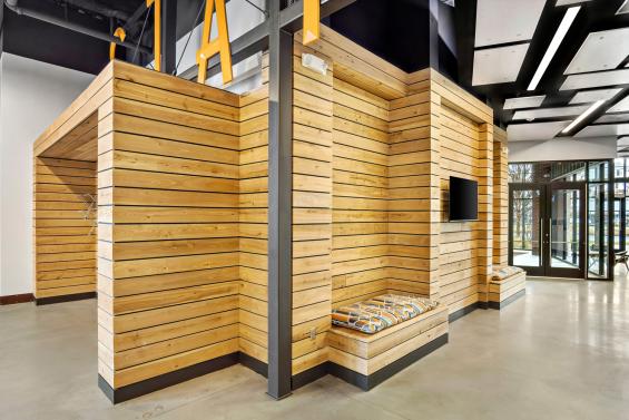 Pioneer Millworks American Gothic Ash with Pure Finish Paneling in The Stations at LoSo Charlotte, NC. Photo by VISIO Photography.