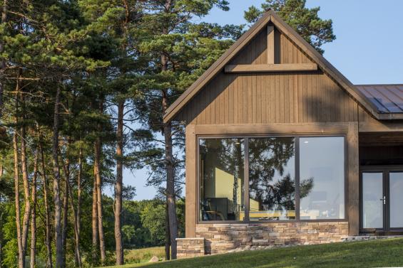 Pioneer Millworks Larch Fossil Siding and Reclaimed Rugged Teak Flooring. Photos by Scott Hemenway